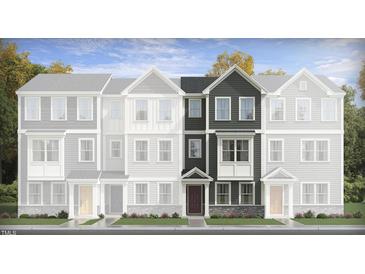 New construction townhome showcasing its modern architectural design and inviting entrance at 334 Carolina Springs Blvd, Apex, NC 27539