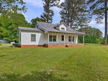 Charming one story home with brick foundation and relaxing front porch at 9652 S Nc-87 Hwy, Graham, NC 27253