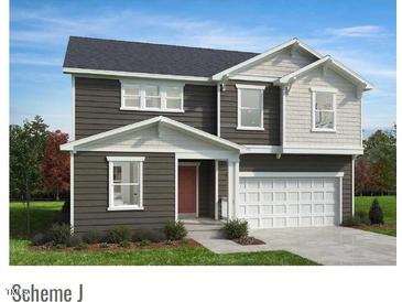 Charming two-story home with a two-car garage, gray and white siding, and a well-manicured front lawn at 361 Spelt Ct, Rolesville, NC 27571