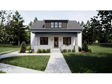Charming craftsman-style home with a welcoming front porch and well-maintained landscaping at 909 Oberlin Rd, Raleigh, NC 27605