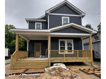 New construction with a covered front porch, offering a charming and inviting entryway at 618 Price Ave, Durham, NC 27701