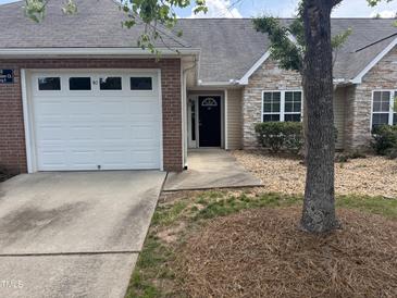 Charming condo with a one car garage and stone accents at 2520-102 Gordon Glen Ct, Raleigh, NC 27617