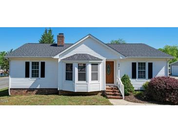 Charming house featuring a well-maintained front yard and inviting entrance at 500 Lemontree Ct, Graham, NC 27253