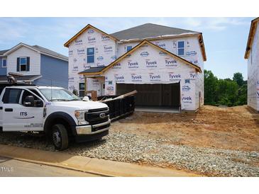 Image of an unfinished two-story home with a Tyvek wrap at 2230 Cherry Creek Rd, Haw River, NC 27258