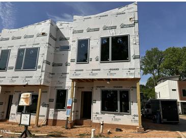 New construction townhome with windows installed at 1523 1/2 Sunrise Ave, Raleigh, NC 27608