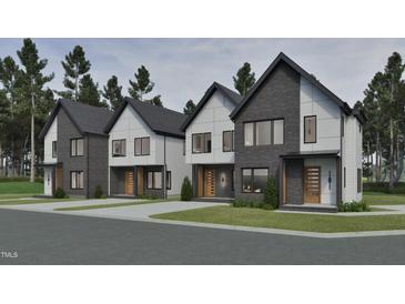 Modern exteriors showcasing sleek, two-story homes with contrasting textures and contemporary design elements at 1800 Pershing Rd, Raleigh, NC 27608