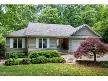 Charming single-story home with mature landscaping, including a Japanese Maple tree at 1416 Dunbar Ct, Cary, NC 27511