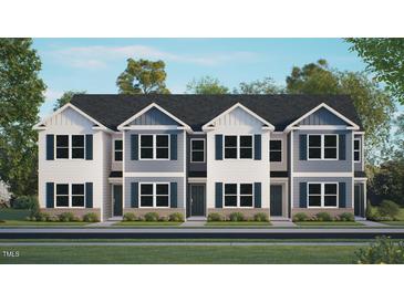 A new townhouse showcasing a modern exterior with clean lines, complemented by fresh landscaping and a welcoming entrance at 8538 Beckett Chase Way, Raleigh, NC 27616