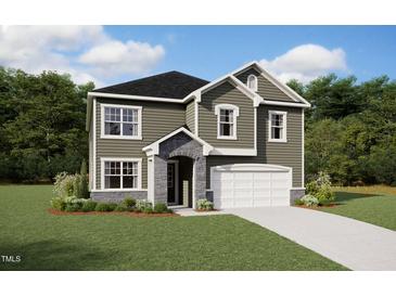 Charming two-story home with stone accents, attached garage, and inviting curb appeal at 236 Golfview Ave, Benson, NC 27504