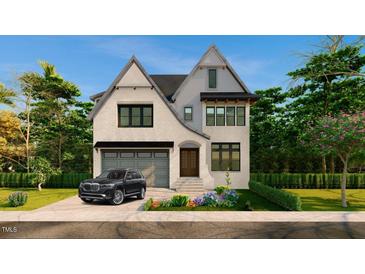 Charming two-story home with a gray two-car garage and manicured lawn at 3008 Eden Harbor Ct, Raleigh, NC 27613
