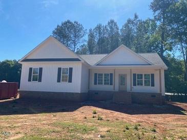 New construction one-story home with white siding and black shutters at 539 Mulberry Rd, Spring Hope, NC 27882