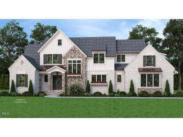 Stunning two-story home featuring stone and white brick with professionally landscaped front yard at 35 Big Bear Dr, Pittsboro, NC 27312