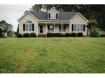 Charming single-Gathering home showcasing a well-maintained lawn and inviting front porch at 780 Pondview Ct, Rocky Mount, NC 27804
