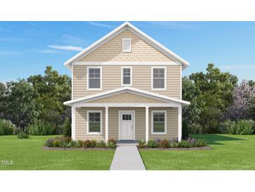 Charming two-story home with a manicured lawn and inviting front porch at 117 Ambergate Ct, Rocky Mount, NC 27804