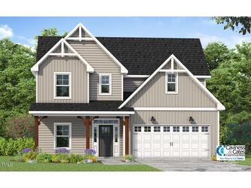 Charming two-story home featuring a classic design and a two-car garage at 70 Nebbiolo Dr, Youngsville, NC 27596
