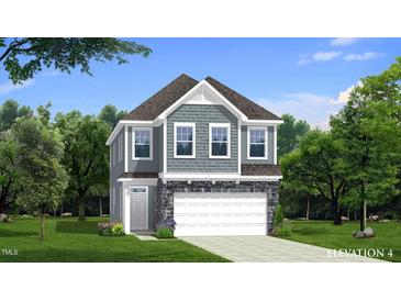 Charming two-story home with stone accents, attached two-car garage, and well-manicured lawn at 1001 Shovelhead Dr # 1, Durham, NC 27703