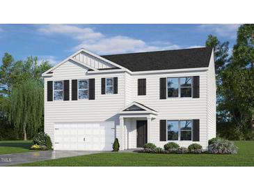 Charming two-story home with black shutters, white siding, and a well-manicured lawn at 7434 Michelle Rd, Rocky Mount, NC 27803