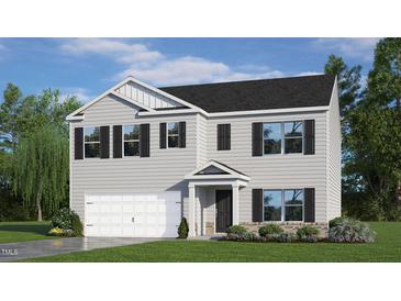 Charming two-story home with white siding, black shutters, and a well-manicured lawn at 7475 Michelle Rd, Rocky Mount, NC 27803