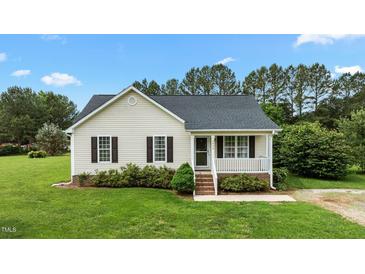 Charming single-story home with a cozy front porch and well-manicured lawn at 3803 Ridgewood Dr, Franklinton, NC 27525