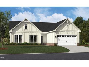 Charming single-Gathering home featuring a two-car garage, a manicured lawn, and stylish modern farmhouse architecture at 1205 Masters Place Way # 183, Durham, NC 27703