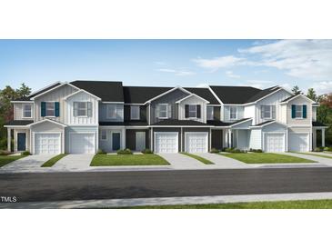 New townhome exteriors feature varied neutral siding, black roof and a one car garage at 170 Parker Ln, Mebane, NC 27302
