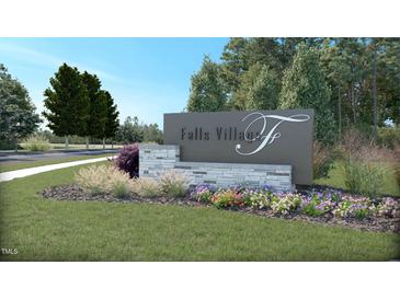 Elegant community sign with stone accents and colorful flower bed at 2006 Kapalua Way # 190, Durham, NC 27703