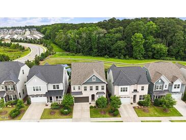 New construction homes feature manicured lawns and an inviting community atmosphere at 113 Mazarin Ln, Cary, NC 27519