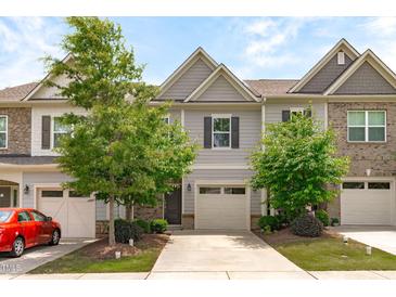 Charming townhouse with attached garage and well-maintained landscaping at 127 Bowerbank Ln, Apex, NC 27539