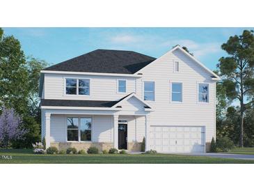 Charming two-story home with white siding, black roof, attached garage, and well-manicured front lawn at 79 Bronco Pace Dr, Clayton, NC 27520