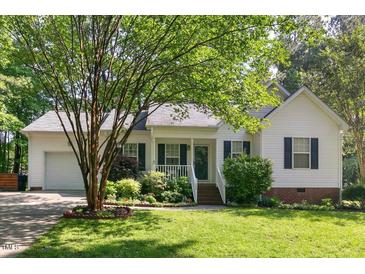 Charming single-Gathering home with well-manicured lawn and beautiful landscaping at 154 Jared Dr, Fuquay Varina, NC 27526