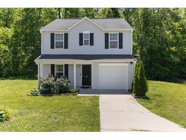 Charming two-story home with light gray siding, black shutters, and a well-maintained front yard at 194 Catskill Ct, Burlington, NC 27217