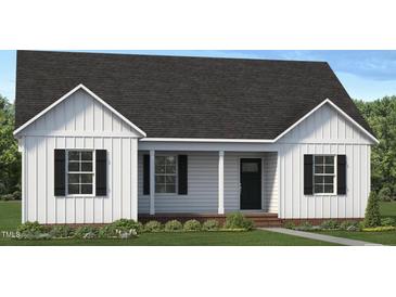 Charming single-story home featuring a modern design with white siding and a welcoming front porch at 4456 Poppy Mallow Ln, Oxford, NC 27565