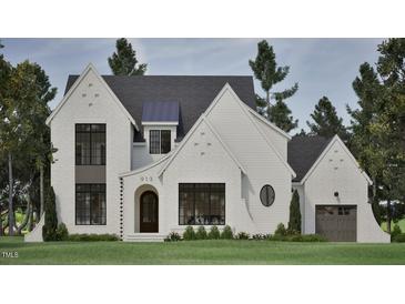 Stunning exterior of home with brick, a dark gray roof, and black frame windows creating a very modern look at 913 Tyrrell Rd, Raleigh, NC 27609
