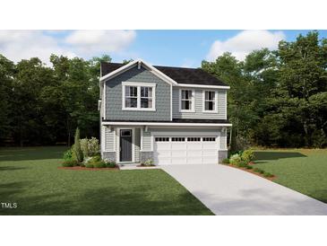 Charming two-story home showcasing stylish siding, a welcoming front door, and an attached two-car garage at 107 Vulcan St, Garner, NC 27529