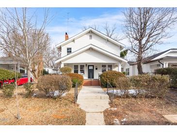 Charming two-story home with a welcoming front porch and well-maintained landscaping at 507 Price Ave, Durham, NC 27701