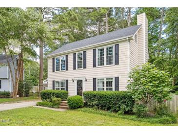 Charming two-story home with black shutters and mature landscaping at 8116 Bentwood Pl, Raleigh, NC 27615