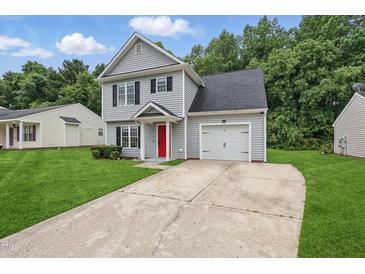 Charming two-story home featuring light gray siding, black shutters, a bright red front door, and an attached single-car garage at 5408 Gunnette Dr, Raleigh, NC 27610