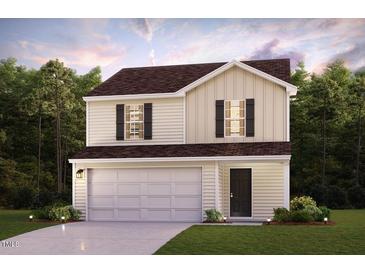 Charming two-story home with a neutral color palette, black shutters, and an attached two-car garage at 7021 Peppermill Way, Rocky Mount, NC 27804