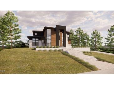 Stunning modern home with mixed materials and professional landscaping at 1021 Ferson, Apex, NC 27519