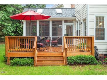 Inviting deck featuring outdoor seating, perfect for entertaining at 103 Rose Sky Ct, Cary, NC 27513