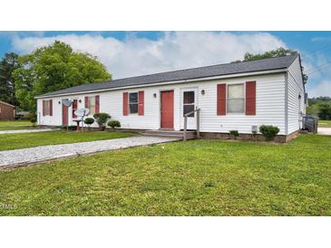 Charming multi-unit home with a well-maintained lawn and inviting red accents at 501 Magnolia Dr, Rocky Mount, NC 27801
