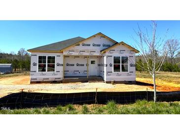 New construction home featuring a classic design and a spacious, undeveloped yard at 90 Brookhaven Dr, Spring Hope, NC 27882