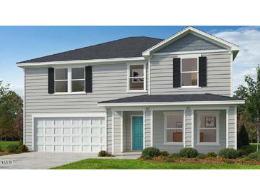 Charming two-story home with gray siding, attached garage, and manicured front lawn at 91 Caspian Ct, Lillington, NC 27546