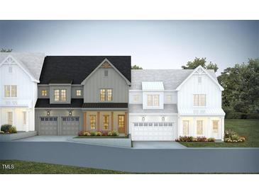 Charming two-story homes with two-car garages, neutral color palettes, and manicured lawns at 1013 Coldspring Circle, Durham, NC 27705
