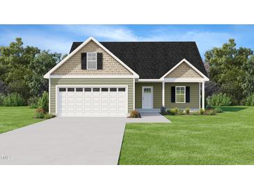 Charming, newly constructed home featuring a gabled roof and a manicured lawn at 2803 Ricolden Trl, Elon, NC 27244