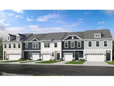 Charming exterior view of newly built townhomes with individual garages and lovely curb appeal at 2724 Sammish Way, Raleigh, NC 27616