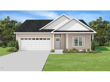 Charming one-story home with a well-maintained lawn, attached garage and delightful curb appeal at 2820 Ricolden Trl, Elon, NC 27244