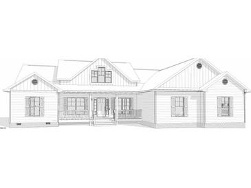 Charming home design featuring a covered porch and detailed window accents at 5300 Langdon Dr, Oxford, NC 27565