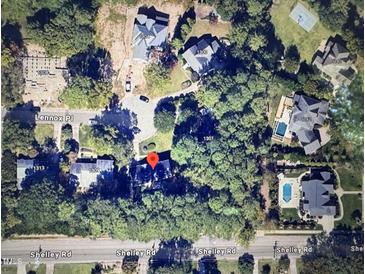 An aerial view of a neighborhood, with a variety of different styles of homes at 1305 Lennox Pl, Raleigh, NC 27612
