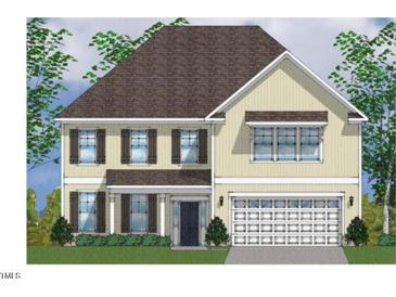 Charming two-story home with a classic design, complete with dark shutters and a welcoming two-car garage at 15 Black Walnut Dr # 183, Garner, NC 27529